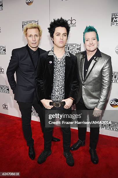 Musicians Mike Dirnt, Billie Joe Armstrong and Tré Cool of Green Day attends the 2016 American Music Awards at Microsoft Theater on November 20, 2016...