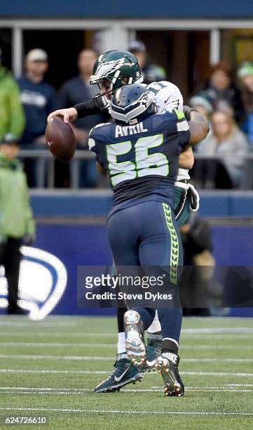 Defensive end Cliff Avril of the Seattle Seahawks knocks the ball loose from the hands of Quarterback Carson Wentz of the Philadelphia Eagles at...