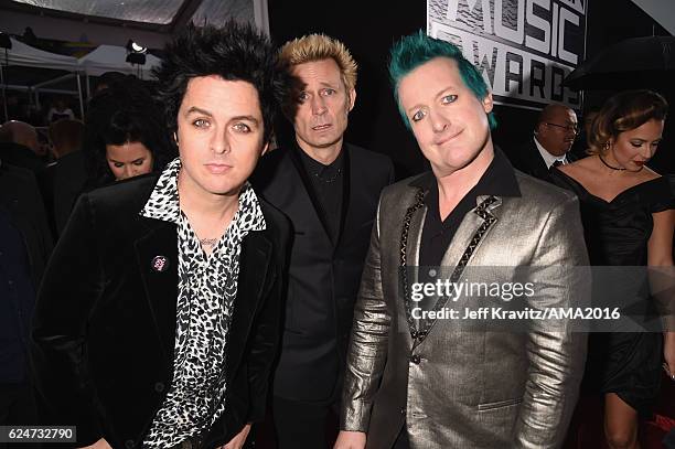 Musicians Billie Joe Armstrong, Mike Dirnt and Tre Cool of Green Day attend the 2016 American Music Awards at Microsoft Theater on November 20, 2016...