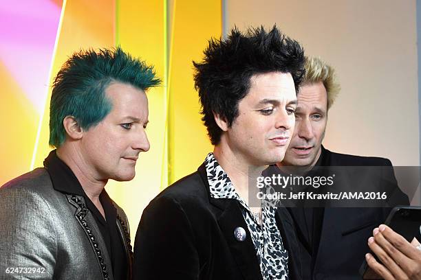 Musicians Tre Cool, Billie Joe Armstrong and Mike Dirnt of Green Day attend the 2016 American Music Awards at Microsoft Theater on November 20, 2016...