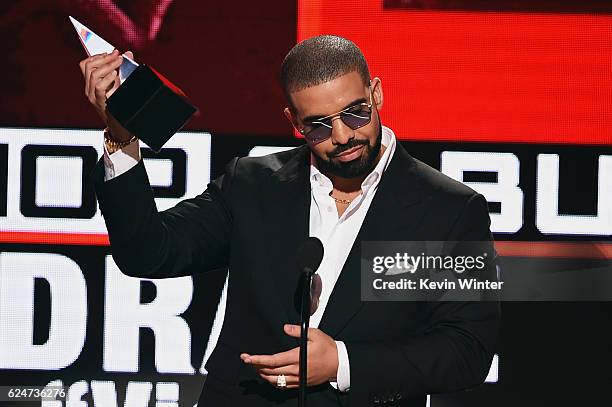 Rapper Drake accepts Favorite Rap/Hip-Hop Album for 'Views' onstage during the 2016 American Music Awards at Microsoft Theater on November 20, 2016...