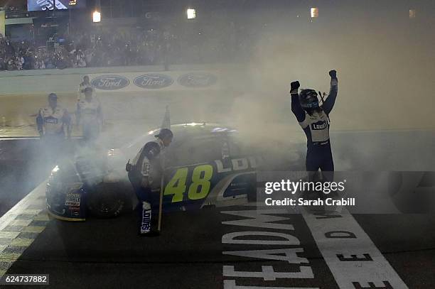 Jimmie Johnson, driver of the Lowe's Chevrolet, celebrates after winning the NASCAR Sprint Cup Series Ford EcoBoost 400 and the 2016 NASCAR Sprint...