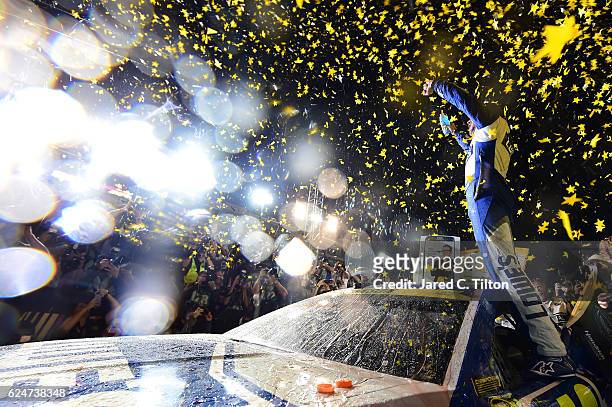 Jimmie Johnson, driver of the Lowe's Chevrolet, celebrates in Victory Lane after winning the NASCAR Sprint Cup Series Ford EcoBoost 400 and the 2016...
