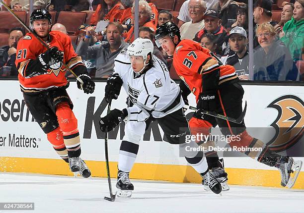 Chris Wagner and Nick Ritchie of the Anaheim Ducks pressure Jordan Nolan of the Los Angeles Kings during the game at Honda Center on November 20,...