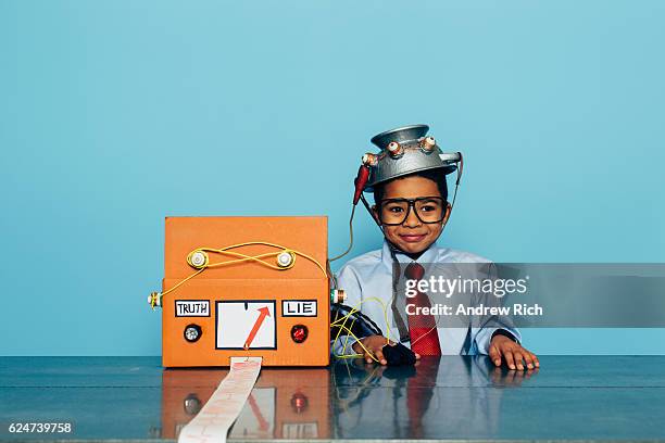 young businessman with homemade lie detector - interview funny stockfoto's en -beelden