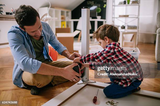 two handymen - model kit stock pictures, royalty-free photos & images
