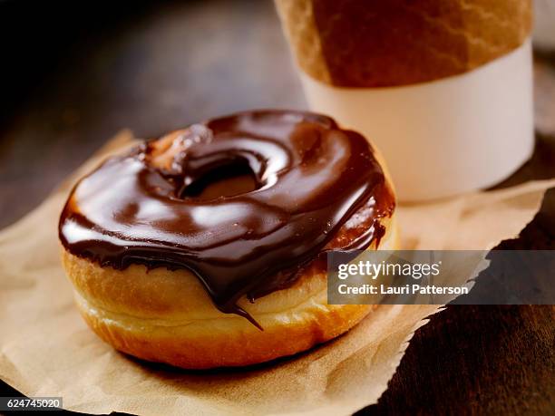 chocolate donut - coffe to go stock pictures, royalty-free photos & images