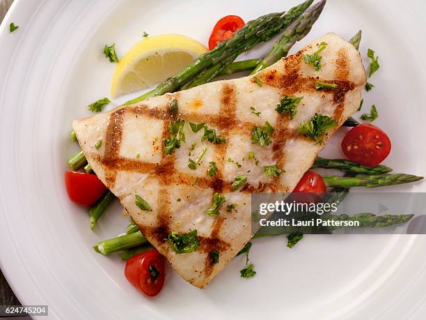 grilled halibut with asparagus and tomatoes - halibut stock pictures, royalty-free photos & images