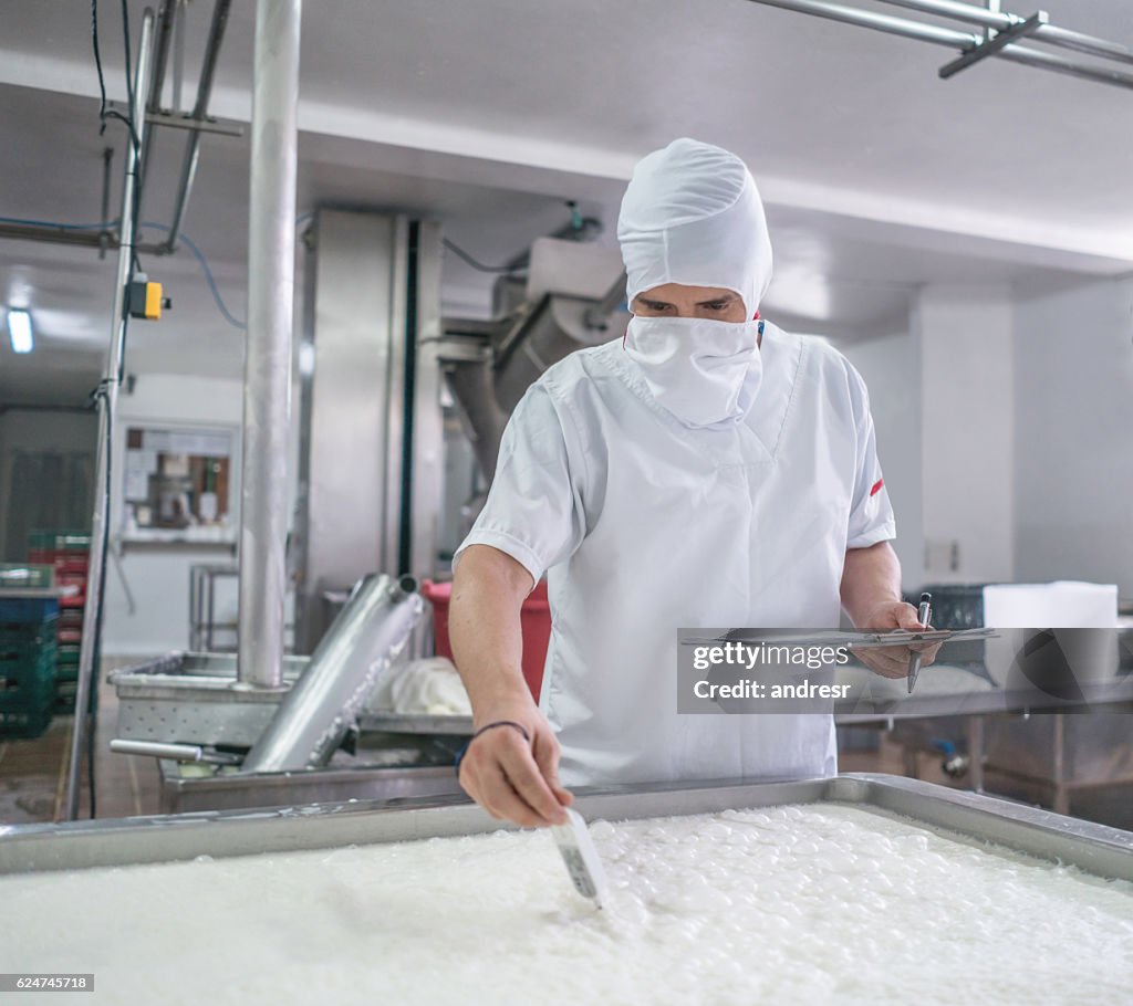 Man working at a dairy factory