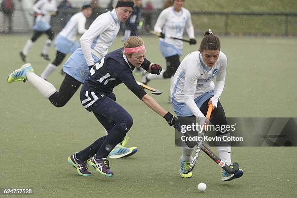 Tufts Mary Kate Patton battles with Messiahs Kristin Donohue during the Division III Women's Field Hockey Championship held at McCoy Field on...