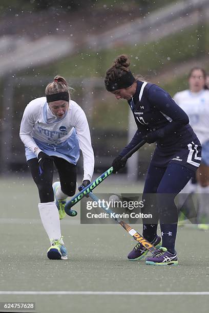 Tufts Mary Travers battles with Messiahs Shayna Landis during the Division III Women's Field Hockey Championship held at McCoy Field on November 20,...