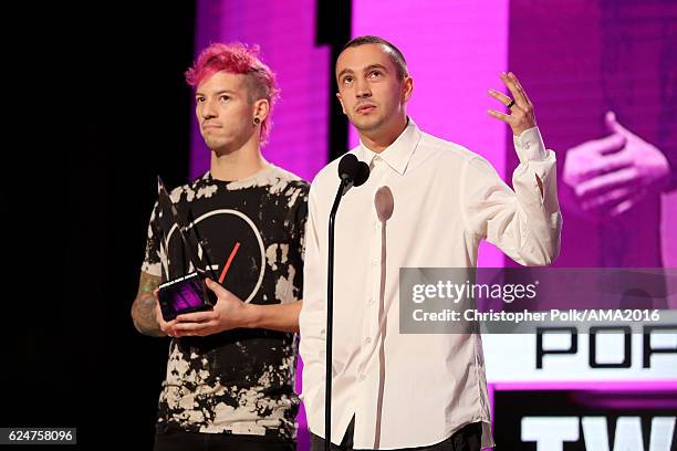 Recording artists Josh Dun and Tyler Joseph of Twenty One Pilots accept the Favorite Duo or Group award onstage the 2016 American Music Awards at...