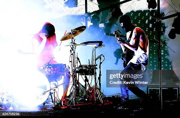 Musicians Josh Dun and Tyler Joseph of Twenty One Pilots perform onstage during the 2016 American Music Awards at Microsoft Theater on November 20,...