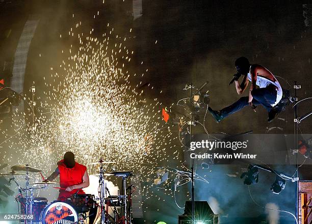 Musicians Josh Dun and Tyler Joseph of Twenty One Pilots perform onstage during the 2016 American Music Awards at Microsoft Theater on November 20,...