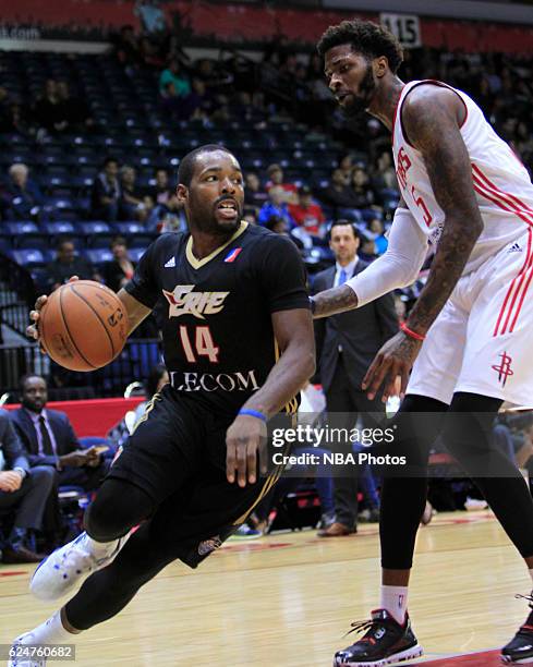 Brandis Raley-Ross of the Erie BayHawks drives past Chris Walker of the Rio Grande Valley Vipers at the State Farm Arena November 20, 2016 in...
