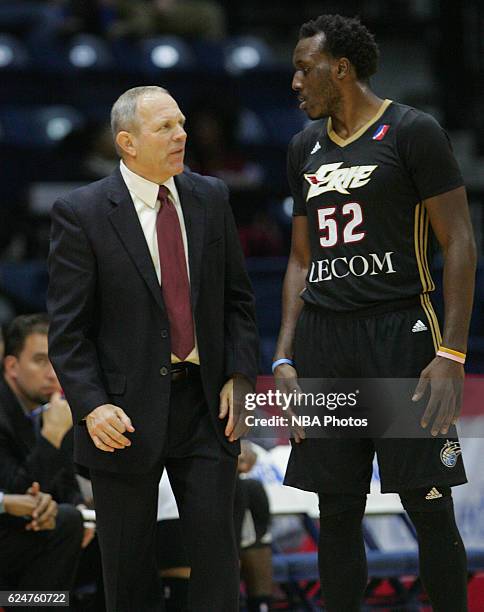 Bill Peterson, head coach of the Erie BayHawks, talks with TJ Price during a time-out against the Rio Grande Valley Vipers at the State Farm Arena...