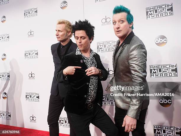 Musicians Mike Dirnt, Billie Joe Armstrong and Tré Cool of Green Day attends the 2016 American Music Awards at Microsoft Theater on November 20, 2016...