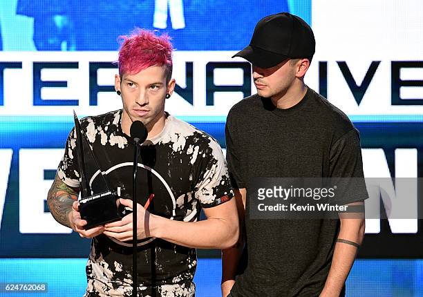 Musicians Josh Dun and Tyler Joseph of Twenty One Pilots accept Favorite Pop/Rock Band/Duo/Group onstage during the 2016 American Music Awards at...