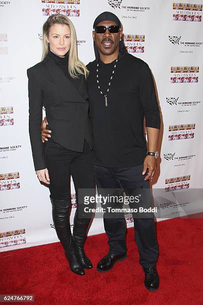 Paige Butcher and Eddie Murphy attend the Debut Gallery Opening Of Bria Murphy's "Subconscious" at Los Angeles Contemporary Exhibitions on November...