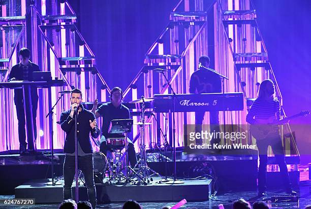 Singer Adam Levine and Maroon 5 perform onstage during the 2016 American Music Awards at Microsoft Theater on November 20, 2016 in Los Angeles,...