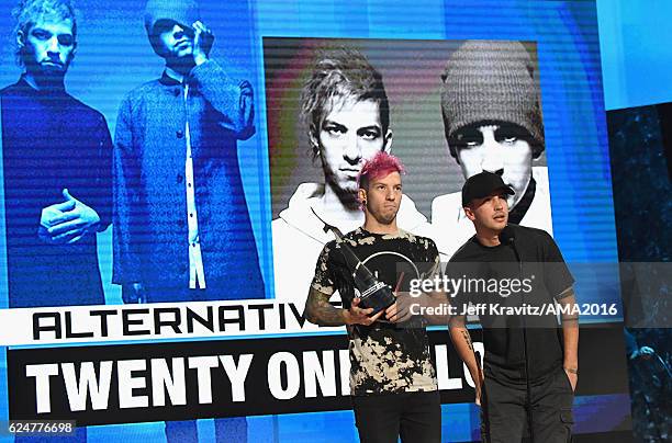 Musicians Josh Dun and Tyler Joseph of Twenty One Pilot onstage at the 2016 American Music Awards at Microsoft Theater on November 20, 2016 in Los...