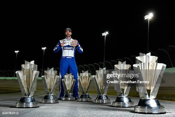 Jimmie Johnson, driver of the Lowe's Chevrolet, poses for a portrait after winning the 2016 NASCAR Sprint Cup Series Championship at Homestead-Miami...