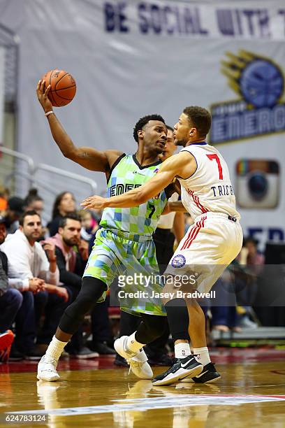 Wayne Selden Jr. #7 of the Iowa Energy handles the ball against Brandon Triche of the Delaware 87ers in an NBA D-League pre-season game on November...