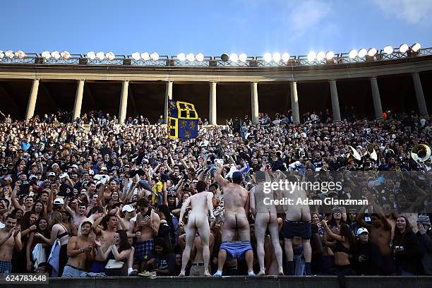 Naked fans cheer during the game between the Yale Bulldogs and the Harvard Crimson at Harvard Stadium on November 19, 2016 in Boston, Massachusetts.