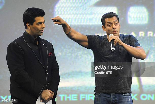 Indian Bollywood film director Karan Johar and Bollywood actor Salman Khan talk onstage during a promotional event for the forthcoming science...