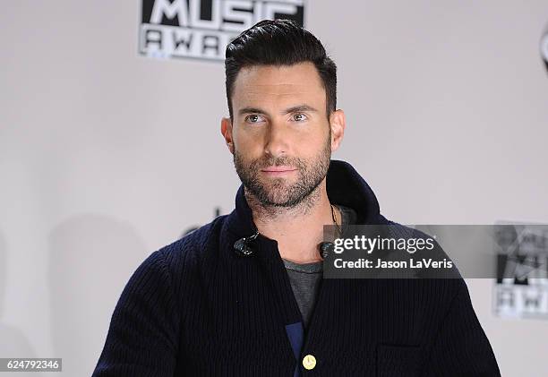 Adam Levine of Maroon 5 poses in the press room at the 2016 American Music Awards at Microsoft Theater on November 20, 2016 in Los Angeles,...