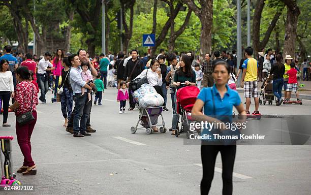 Hanoi, Vietnam Pedestrians on a street in Hanoi on October 30, 2016 in Hanoi, Vietnam.