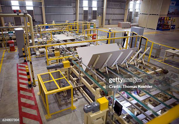 Hai Phong, Vietnam Production of gypsum boards at Knauf Vietnam Ltd. View from above into a production hall on October 30, 2016 in Hai Phong, Vietnam.