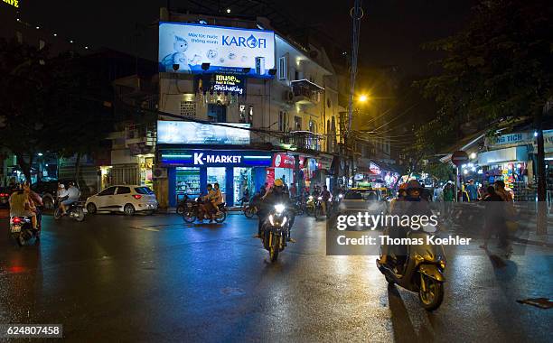 Hanoi, Vietnam Road traffic in Hanoi by night on October 30, 2016 in Hanoi, Vietnam.