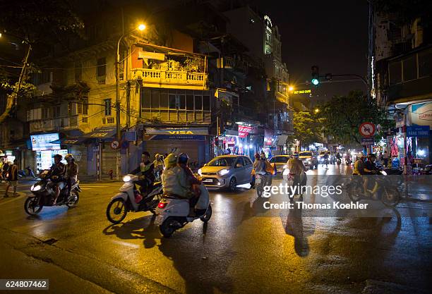 Hanoi, Vietnam Road traffic in Hanoi by night on October 30, 2016 in Hanoi, Vietnam.