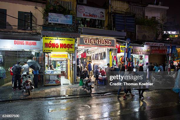 Hanoi, Vietnam Shopping street in Hanoi by night on October 30, 2016 in Hanoi, Vietnam.