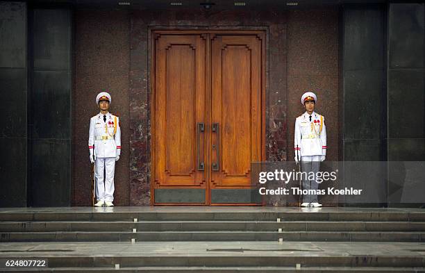 Hanoi, Vietnam Two guards are standing next to the entrance of the Ho Chi Minh Mausoleum in Hanoi on October 31, 2016 in Hanoi, Vietnam.