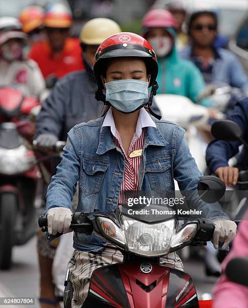 Ho Chi Minh City, Vietnam Disguised scooter driver in Ho Chi Minh City on November 01, 2016 in Ho Chi Minh City, Vietnam.