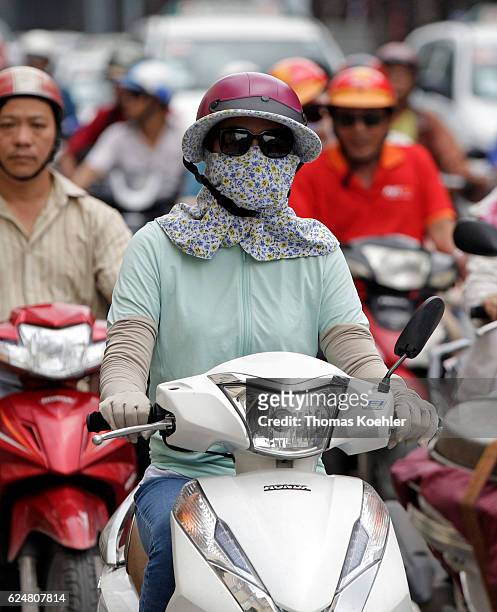 Ho Chi Minh City, Vietnam Disguised scooter driver in Ho Chi Minh City on November 01, 2016 in Ho Chi Minh City, Vietnam.