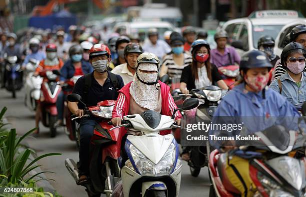 Ho Chi Minh City, Vietnam Disguised scooter driver in Ho Chi Minh City on November 01, 2016 in Ho Chi Minh City, Vietnam.