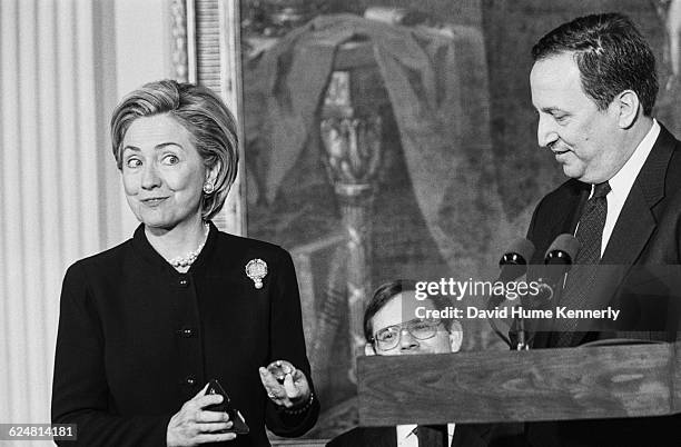 First Lady Hillary Clinton presents the Dolly Madison Commemorative Coin in the East Room of the White House on January 11, 1999. Standing with her...