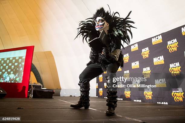 Cosplayer dressed as Shinigami from Death Note on day 2 of the November Birmingham MCM Comic Con at the National Exhibition Centre in Birmingham, UK...