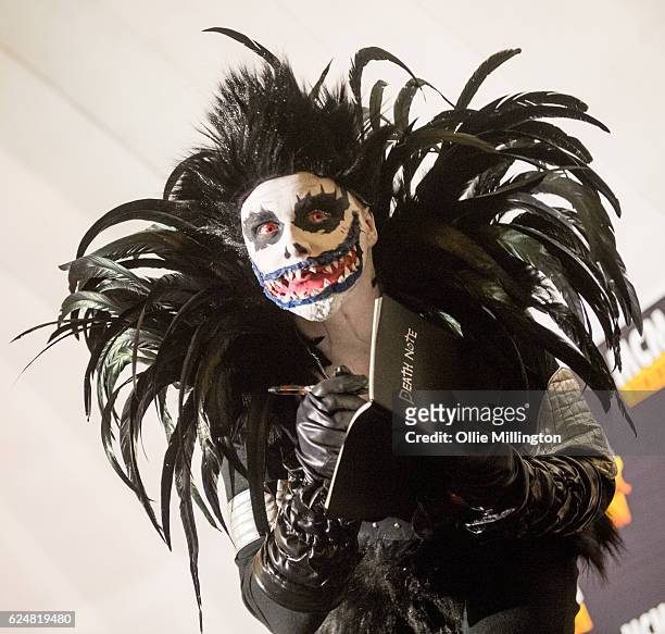 Cosplayer dressed as Shinigami from Death Note on day 2 of the November Birmingham MCM Comic Con at the National Exhibition Centre in Birmingham, UK...