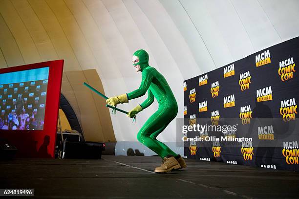 Cosplayer dressed as Kick-Ass on day 2 of the November Birmingham MCM Comic Con at the National Exhibition Centre in Birmingham, UK on November 20,...