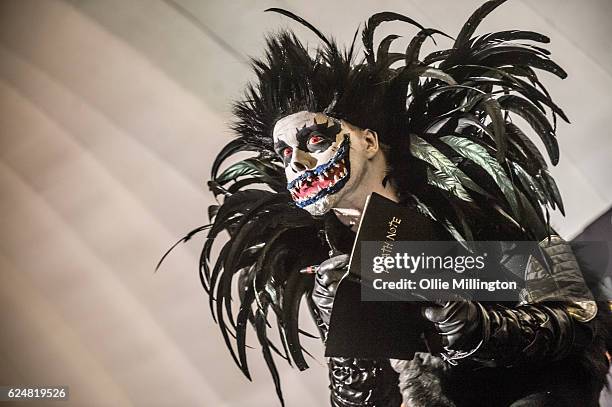 Cosplayer dressed as Shinigami from Death Note on day 2 of the November Birmingham MCM Comic Con at the National Exhibition Centre in Birmingham, UK...