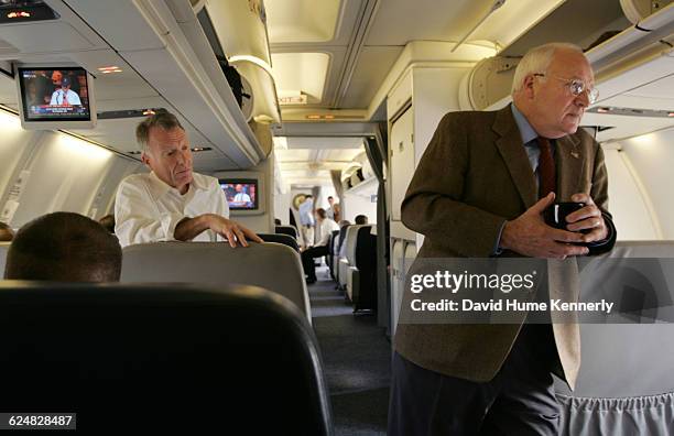 Vice President Dick Cheney , with his chief of staff Lewis 'Scooter' Libby behind him, aboard Air Force 2 during the last stages of the campaign,...
