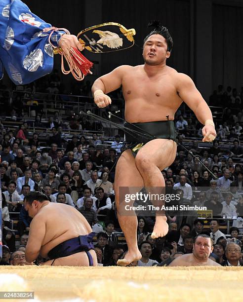 Ishiura reacts after his win against Hokutofuji during day nine of the Grand Sumo Kyushu Tournament at Fukuoka Convention Center on November 21, 2016...