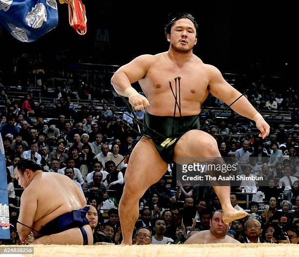 Ishiura reacts after his win against Hokutofuji during day nine of the Grand Sumo Kyushu Tournament at Fukuoka Convention Center on November 21, 2016...