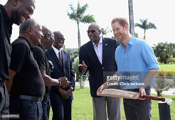 Prince Harry and cricketers Alzarri Joseph , Andy Roberts and Vivian Richards attend a youth sports festival at Sir Vivian Richards Stadium...