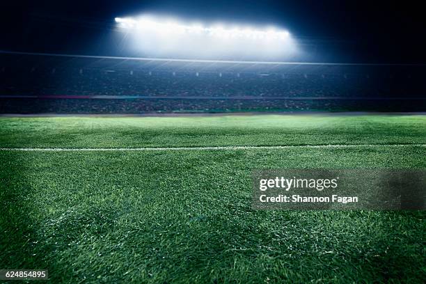 low angle view of sports field in stadium at night - soccer field empty night imagens e fotografias de stock