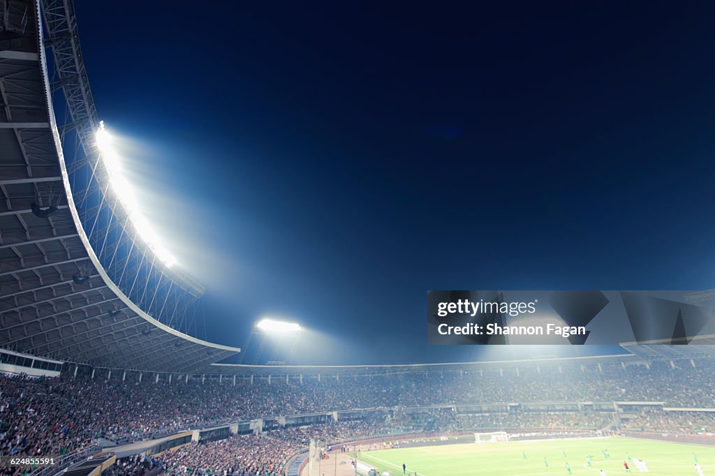 Sports stadium arena game at night